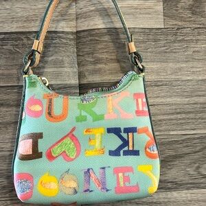 Vintage Y2K Dooney & Bourke mini blue graffiti bag.